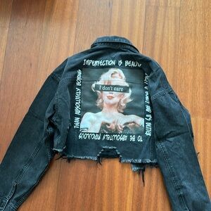 Never worn Marilyn Monroe imperfection is beauty cropped denim jacket size M/L